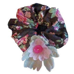 Floral Girl hair scrunchies with pink and blue flowers attached.